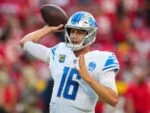 Lions Quarterback Throwing The Ball